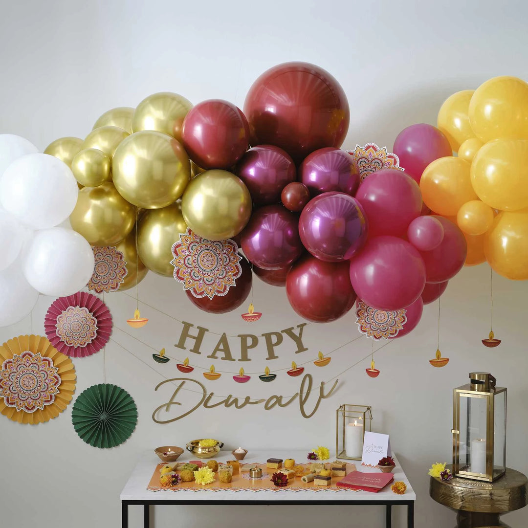 Happy Diwali Grazing Table Set Up With Bright Colours, Balloons and Bunting 