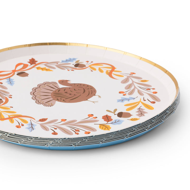 Decorative plate with a turkey and autumnal design on a white background