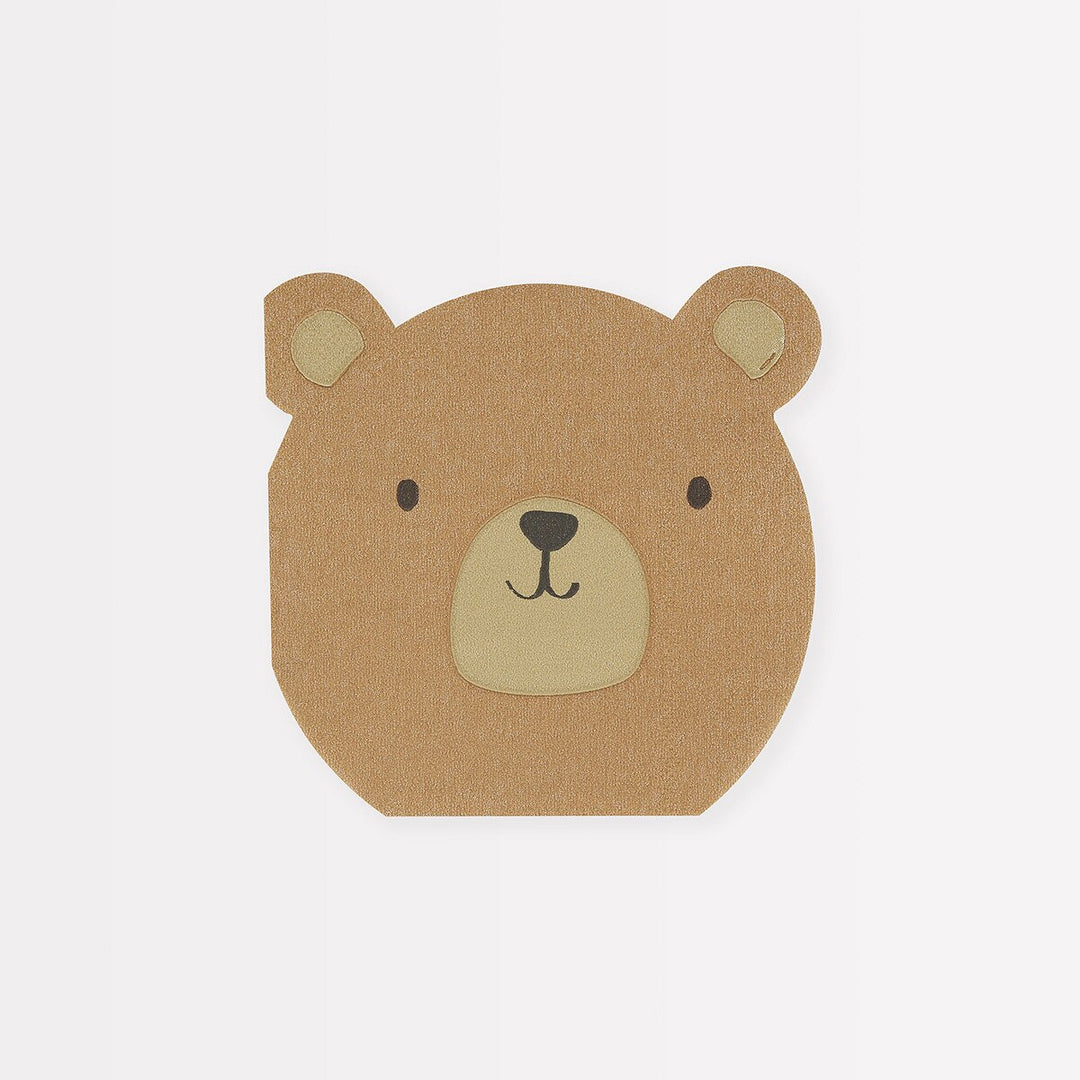 Brown bear-shaped cutout on a white background